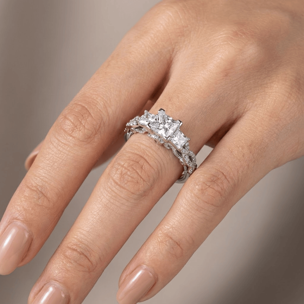 THREE STONE ZIRCONIA SILVER TWIST RING