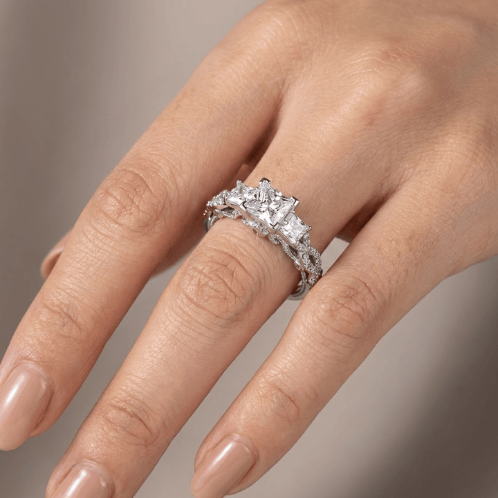 THREE STONE ZIRCONIA SILVER TWIST RING