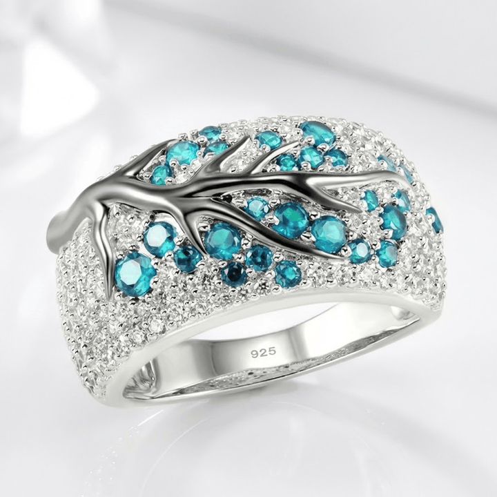SILVER BLUE TOPAZ LEAF RING
