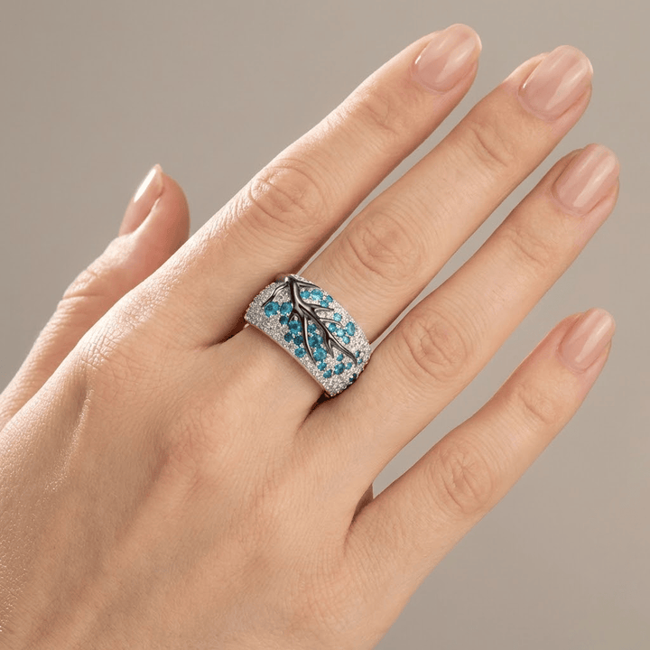 SILVER BLUE TOPAZ LEAF RING